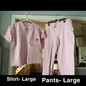 A set of pink scrubs. Barely worn